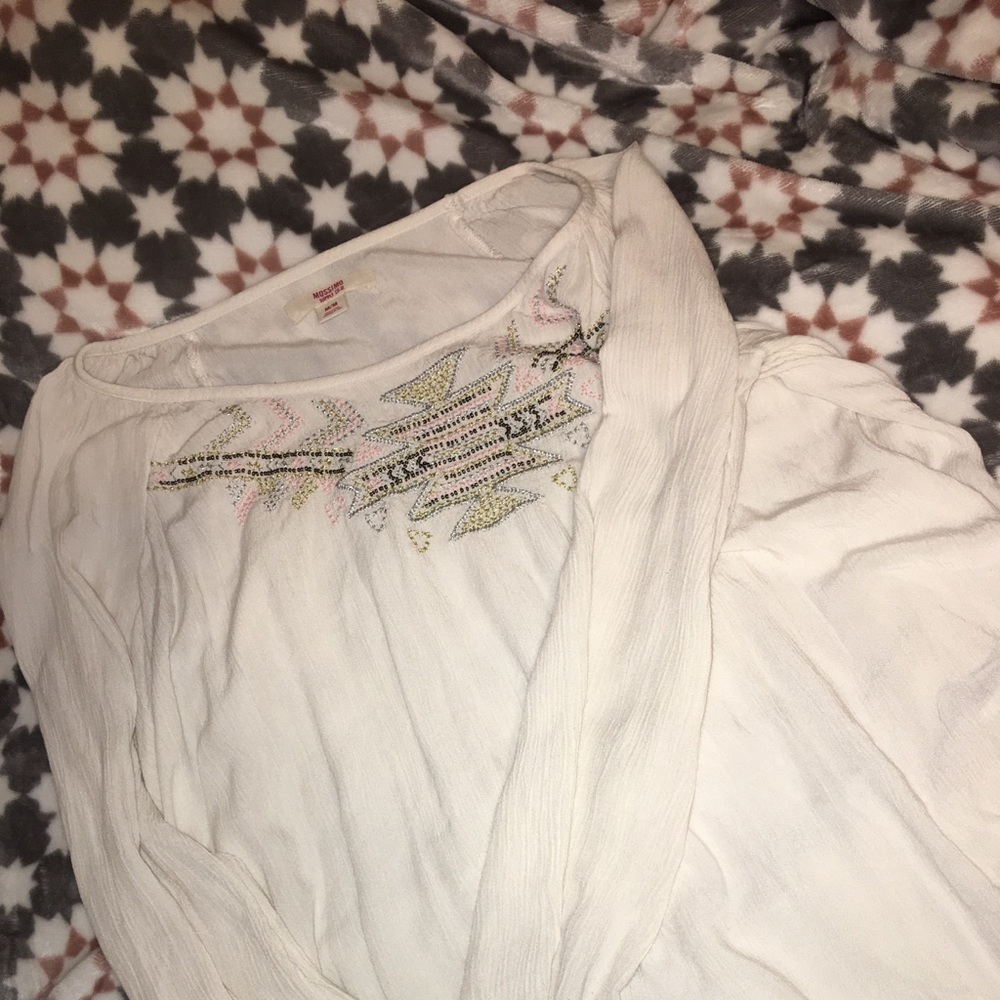 White fancy design blouse